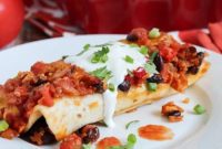 Hearty Chicken, Black Bean and Quinoa Enchiladas