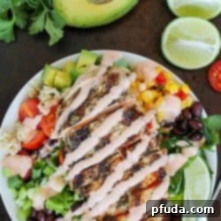 Fiesta Chicken Burrito Bowl 2 Delicious Grilled Chicken Burrito Bowl with tender marinated chicken, brown rice, black beans, and fresh toppings.