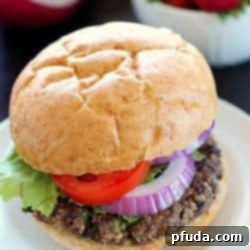 Quinoa Black Bean Burgers - meatless patties full of black beans, quinoa and spices. You won't believe these are vegetarian! The flavor is so delicious and only 270 calories per burger!