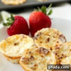 Savory Bacon & Egg Breakfast Bites 2 Mini Bacon Egg Muffins are healthy little breakfast bites full of yummy protein. Only 43 calories and 3 grams of protein in every mini egg muffin! They're easy to make and perfect to make ahead and grab on the go! AD