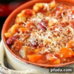 Pasta e Fagioli, which means pasta & beans in Italian, is an easy soup recipe full of beans, ground beef, a little bit of pasta and a lot of flavor! This Olive Garden copycat is a great dinner recipe for any night of the week!