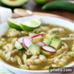 Delicious Chicken Posole Verde with shredded chicken, tender hominy, and a rich verde broth, perfect for a flavorful meal. 
