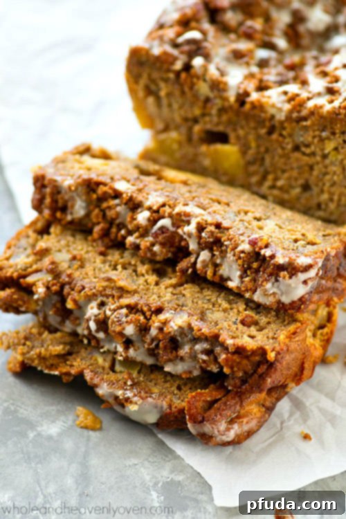 Glazed Apple Pie Streusel Banana Bread, a comforting fall-style banana bread studded with apple pieces and buttery streusel.