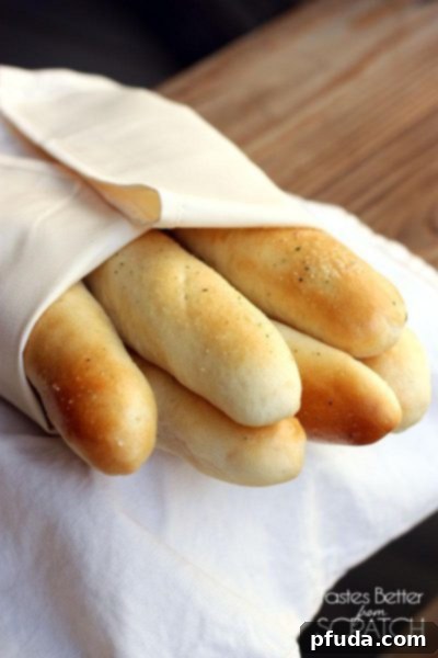 Warm and garlicky Homemade Olive Garden Breadsticks, soft and delicious.