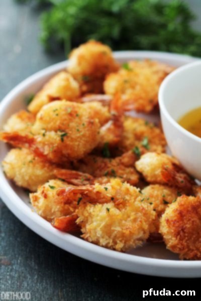 Healthier Baked Batter 'Fried' Shrimp with garlic dipping sauce, a Red Lobster copycat.