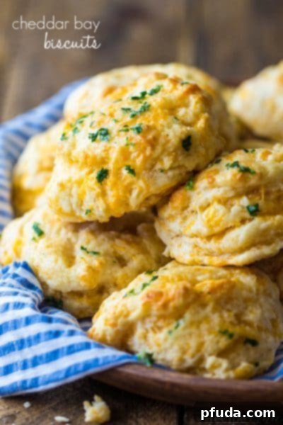 Fluffy and cheesy Copycat Red Lobster Cheddar Bay Biscuits with garlic butter.