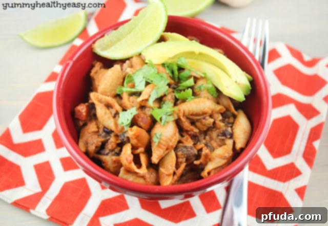 A large skillet filled with Creamy Taco Shells pasta, ready to be served as a one-pan meal.