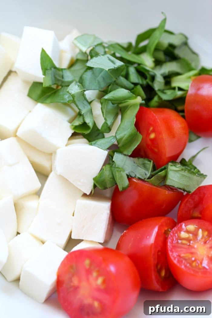 This Easy Tortellini Pesto Salad is full of tortellini pasta, cherry tomatoes, mozzarella, basil and pesto - you can't go wrong!
