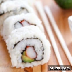 Effortless California Sushi 2 Freshly prepared California Sushi Rolls with avocado, crab, and cucumber.