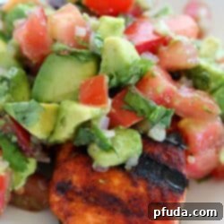 Fiery Grilled Salmon and Cool Avocado Salsa 2 This Spicy Grilled Salmon has an easy to make, sweet/spicy rub that everyone will love! Topped with Avocado Salsa, this dinner is sure to please!