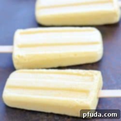 Making homemade popsicles is so easy! These Tropical Protein Popsicles are filled with protein and taste like a tropical vacation! YUM! #AD