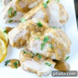 Get ready to WOW your family or guests with this incredibly tender and juicy baked pork tenderloin recipe with marinade sauce! #AD