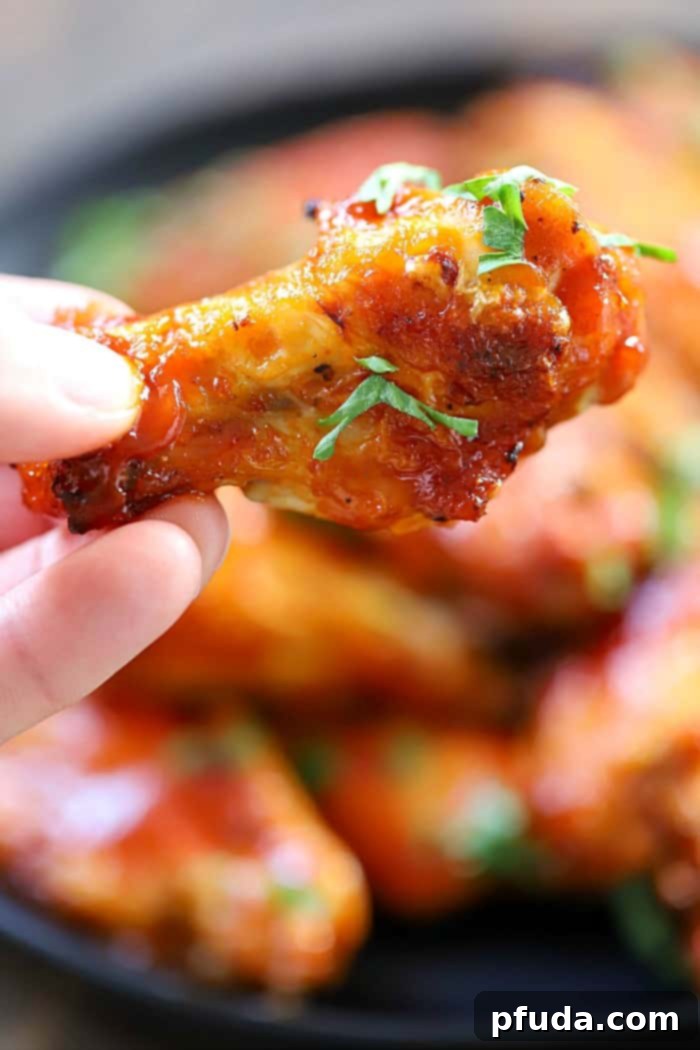 These low-calorie Air Fryer Chicken Wings are a healthier alternative to deep-fried wings, incredibly simple to prepare with only three essential ingredients, and deliver amazing flavor.