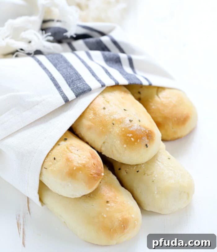 This Easy Homemade Breadsticks Recipe will blow you away! Who knew homemade breadsticks would be so easy?!