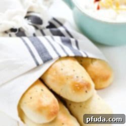 These Easy Homemade Breadsticks are SO good! Serve as a yummy side dish with any meal!