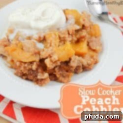 Warm Slow Cooker Peach Cobbler ready to be served