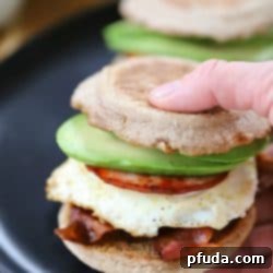 This flavorful Egg, Bacon, and Avocado Breakfast Sandwich will instantly make your morning better. Don't forget to include that creamy, fresh avocado for the perfect touch! #AD