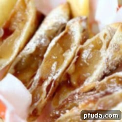 Overhead view of dessert egg rolls cut in half.