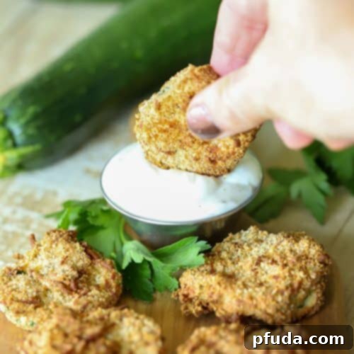 Breaded Zucchini dipped in a yummy sauce.