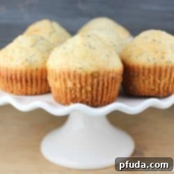 Baked Almond Poppy Seed Delights 2 Close-up of an Almond Poppy Seed Muffin, showing its moist texture