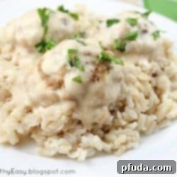 Delicious and moist baked turkey meatballs simmering in a creamy sauce