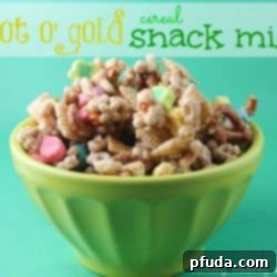 Golden Treasure Cereal Mix 2 A bowl of Pot O' Gold Cereal Snack Mix with colorful Lucky Charms marshmallows