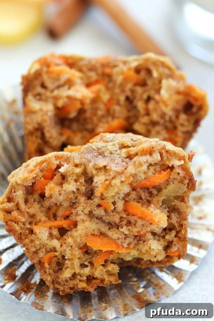 Soft and delicious Apple Carrot Muffins (Sunshine Muffins) with carrots, apples, coconut, cinnamon, and nutmeg. Your kitchen will smell incredible!