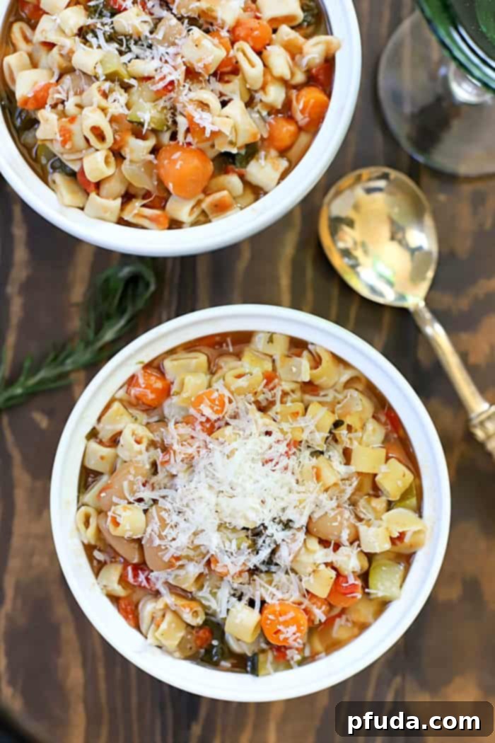 A hearty bowl of homemade Crock Pot Minestrone Soup, brimming with fresh vegetables and pasta, ready to be enjoyed as a family meal.