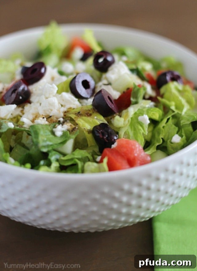 Preparing the simple homemade dressing for Greek salad