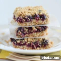 These Skinny Blueberry Crumble Bars have everything you want in a breakfast treat…a delicious crust, a layer of blueberries and a crumbled oat topping. So delicious!