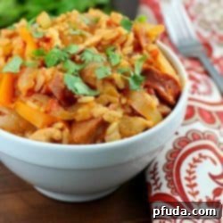 Crock Pot Skinny Chicken Jambalaya, a flavorful and healthy slow cooker meal with chicken, turkey sausage, and rice.