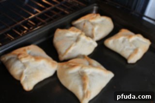 Homemade Chicken Squares 2 Stack of golden brown chicken squares, showing the flaky crust.