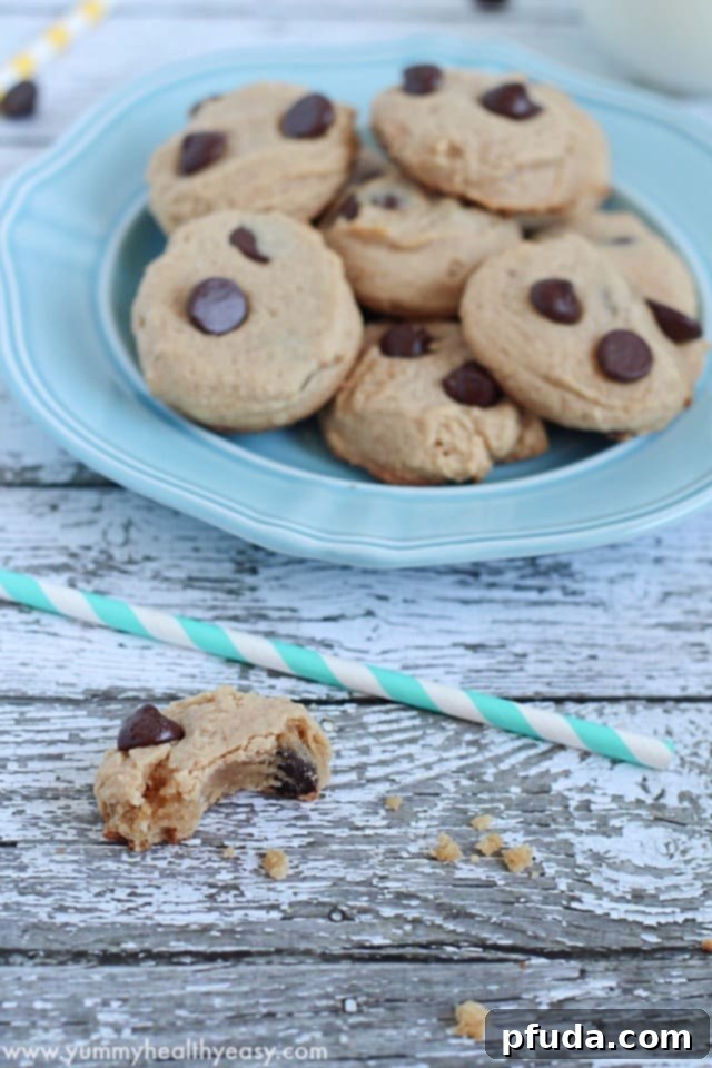 A stack of golden brown easy Bisquick Chocolate Chip Cookies ready to be enjoyed.