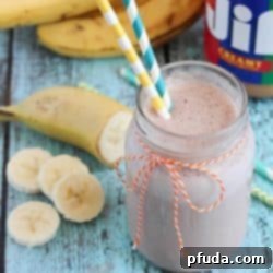 Peanut Butter Banana Smoothie | a perfect blend of peanut butter and bananas for a delicious and refreshing drink, shown in a glass.