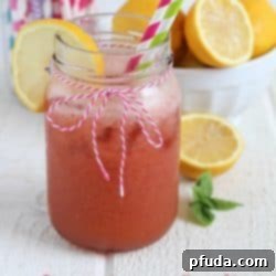Recipe image for Homemade Strawberry Basil Lemonade, a refreshing and healthy summer drink.
