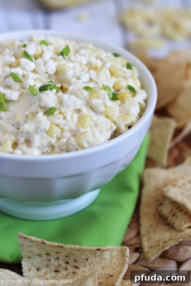 Cheesy Corn Dip - flavorful and creamy dip made from grilled corn and Real California Cotija cheese. Best dip recipe for summer! Cheesy Corn Dip – a vibrant and creamy summer dip made with grilled corn and Real California Cotija cheese, perfect for sharing.