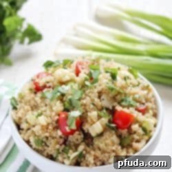 Quinoa Salad with Grilled Corn and Tomatoes - a healthy, vibrant, and delicious side dish recipe perfect for summer BBQs or a light lunch.