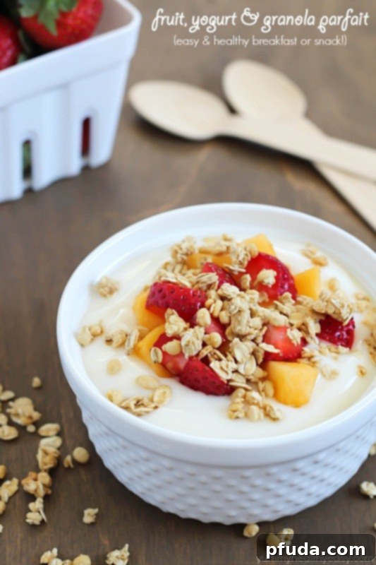 Vibrant fruit, yogurt, and Nature Valley Protein Granola parfait, showcasing a simple yet healthy breakfast or snack for lasting energy. #ad #naturevalleygranola