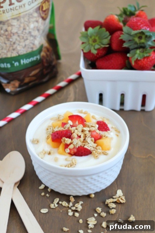 Three perfectly layered fruit, yogurt, and Nature Valley Protein Granola parfaits, ready to be enjoyed as a wholesome breakfast or quick snack. #ad #naturevalleygranola