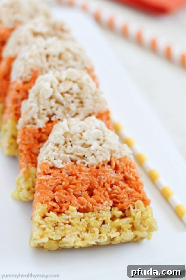 A plate full of homemade Candy Corn Rice Krispie Treats, ready to be served