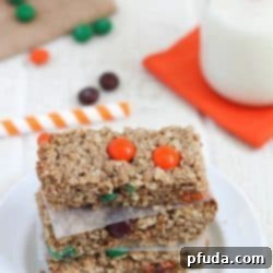 Golden Oatmeal Bars 2 Perfectly baked Oatmeal Cookie Bars on a white plate