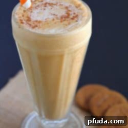Creamy, smooth pumpkin milkshake made without ice cream! Once you try this method, you'll never make a milkshake with ice cream again!