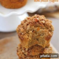 Spiced Gluten-Free Sweet Potato Muffins 2 Gluten Free Sweet Potato Muffins (with cranberry sauce inside, too- perfect fall breakfast!) topped with a brown sugar-nut topping. So moist & delicious!