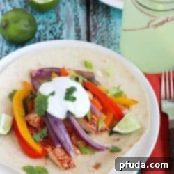 Delicious Quick & Easy Chicken Fajitas Recipe served with toppings.