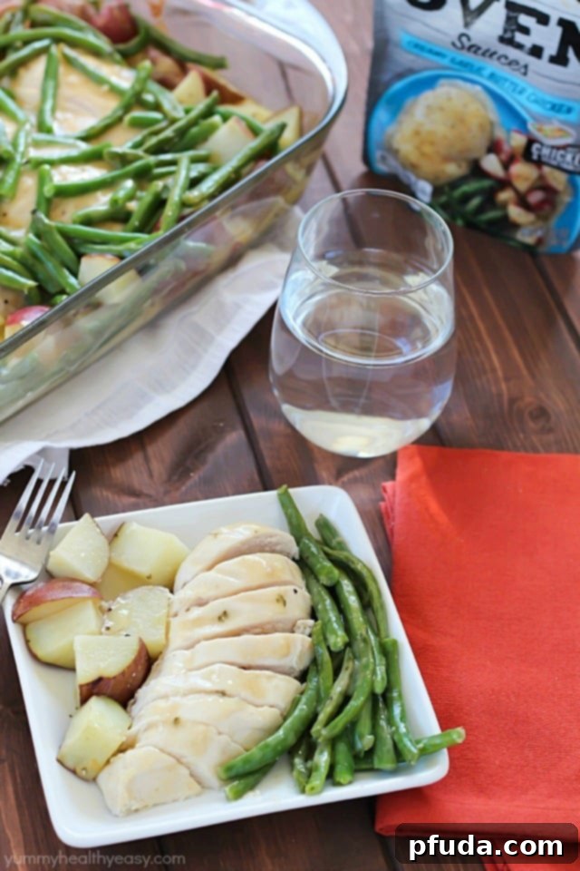 Garlic Butter Chicken with Green Beans and Potatoes One-Pot Dinner 6 A close-up shot of the savory garlic butter chicken, green beans, and potatoes, highlighting the golden-brown chicken and rich, creamy sauce.