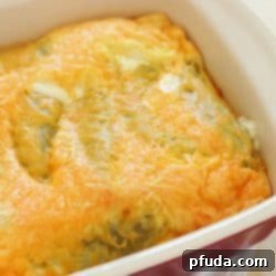 Cheesy Chile Relleno Bake 2 A visually appealing square image of a delicious Chile Relleno Casserole, perfect for Pinterest sharing.