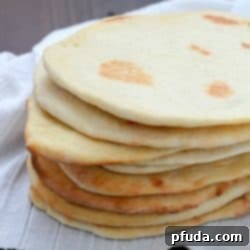 Delicious homemade naan bread recipe card image.