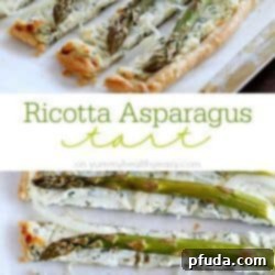 Ricotta Asparagus Tart - a crust of puff pastry, a filling of herbed ricotta, parmesan and romano cheeses, a layer of thinly sliced onions and topped with asparagus. Perfect for spring!!