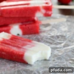 Dreamy Strawberry Yogurt Pops 2 Strawberry Yogurt Popsicles in molds, a refreshing and healthy dessert