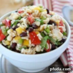 Top-down view of the freshly prepared Southwestern Orzo Salad, ready to be enjoyed.